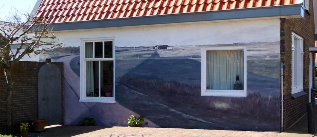 Muurschildering op een huis in Den Hoorn op Texel