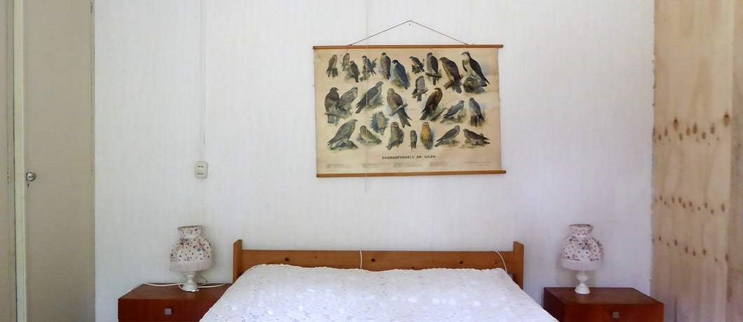 De tuinkamer annex slaapkamer in het vakantiehuis in Oude Willem