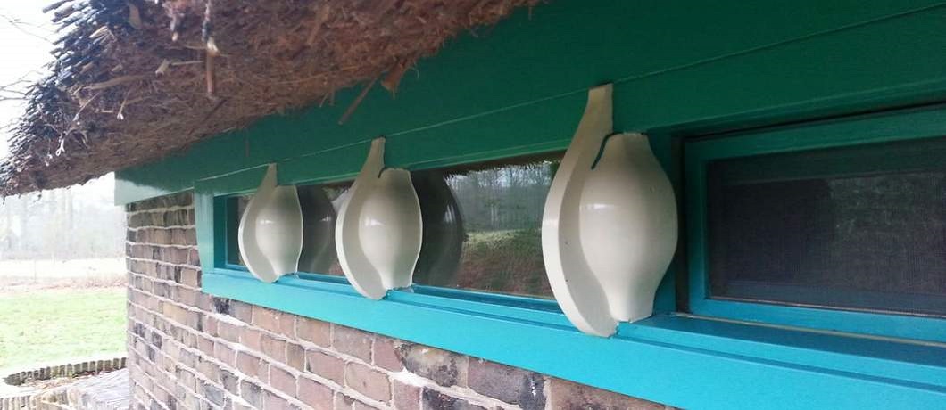 Detail van een raam in Amsterdamse Schoolstijl