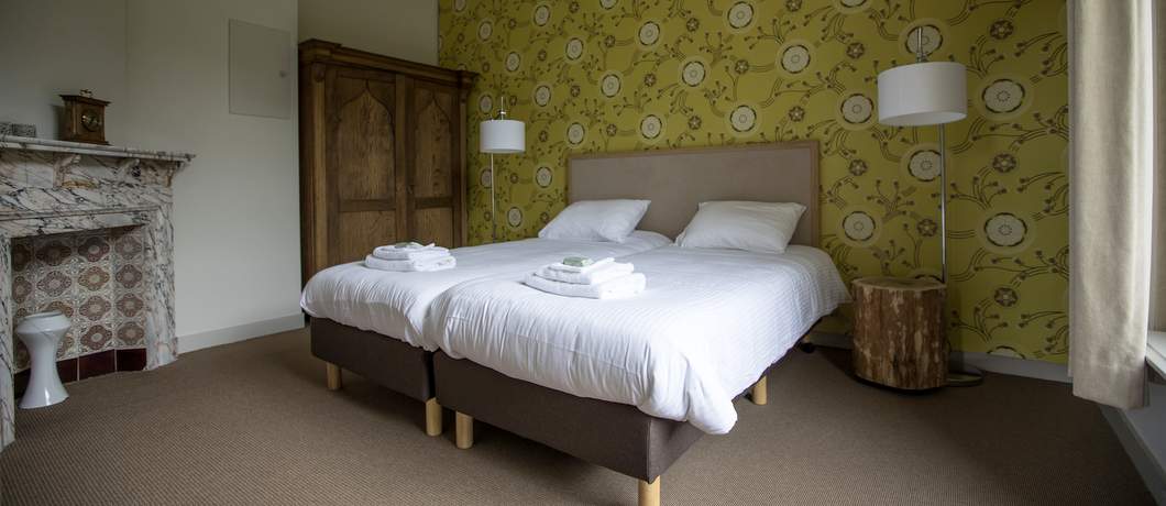 Badkamer van de laansuite in villa Oud Groevenbeek